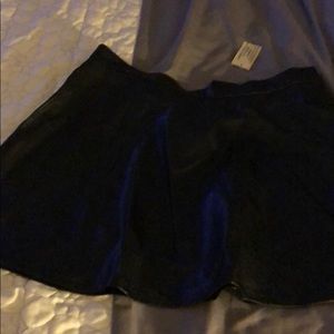 Black leather skirt with tags